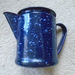VINTAGE BLUE AND WHITE METAL PITCHER
